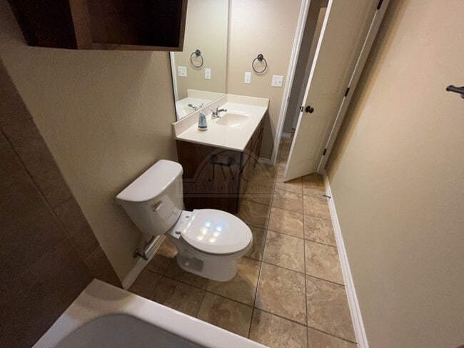 Building Photo - 203 Sladecek Dr