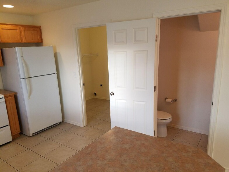 Laundry Room and half bath conveniently located off of the Kitchen. - 440B Laguna Dr