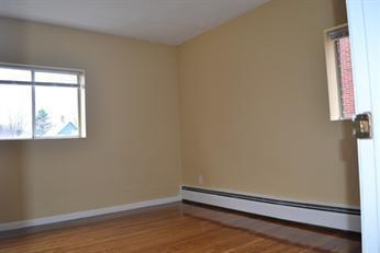 Building Photo - Close to everything West Roxbury offers! Bright 2-bedroom condo for rent!