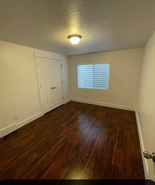 Building Photo - Spacious 4-Bedroom Home with Finished Basement in Taylorsville