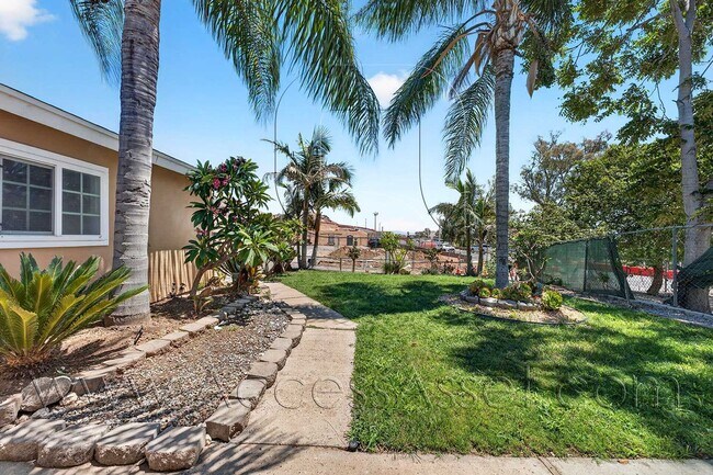 Building Photo - Charming 4 Bedroom Home with Private Yard & Garage Parking