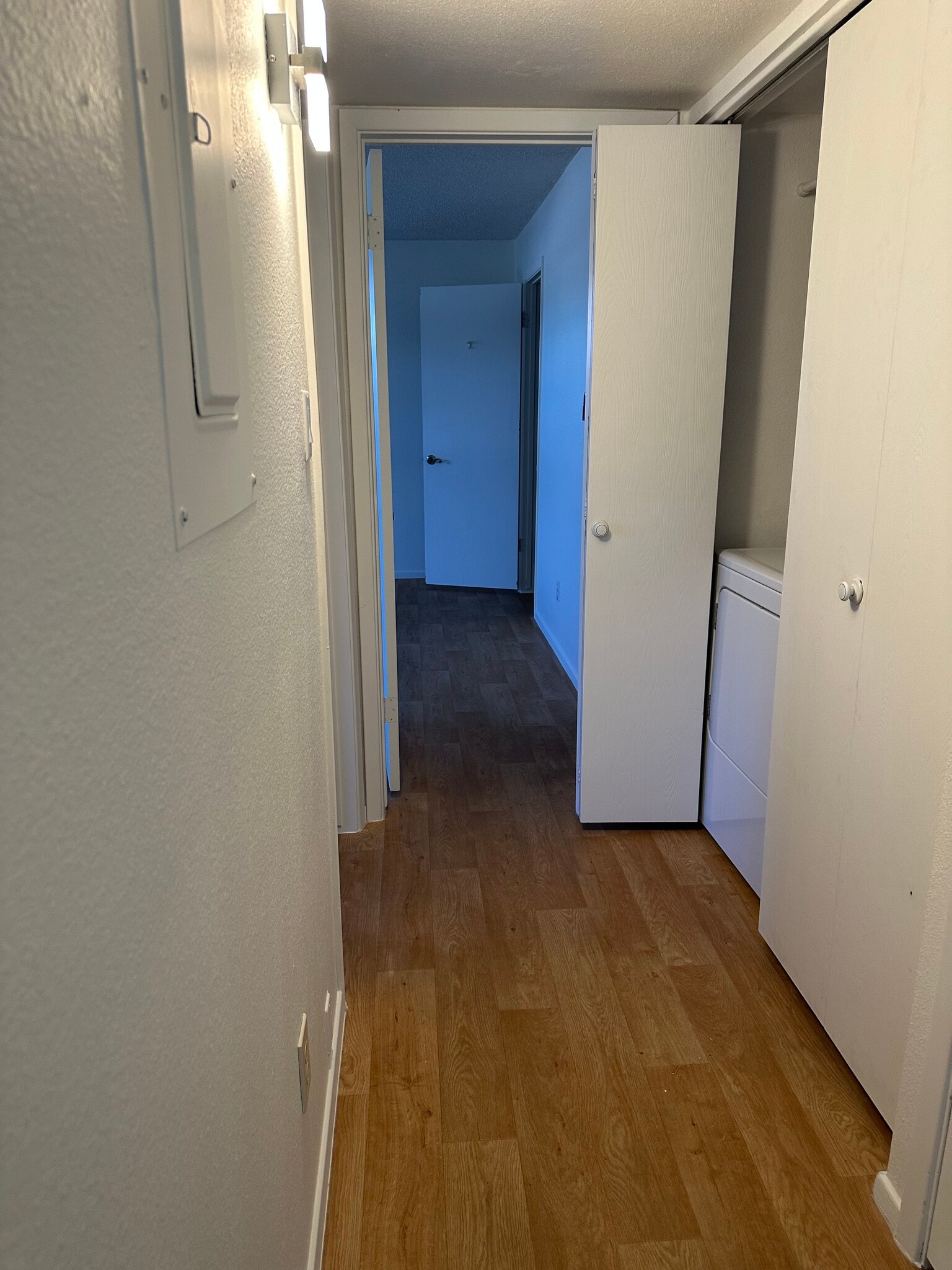 Hallway to Primary Bedroom (laundry) - 425 S Parkcrest