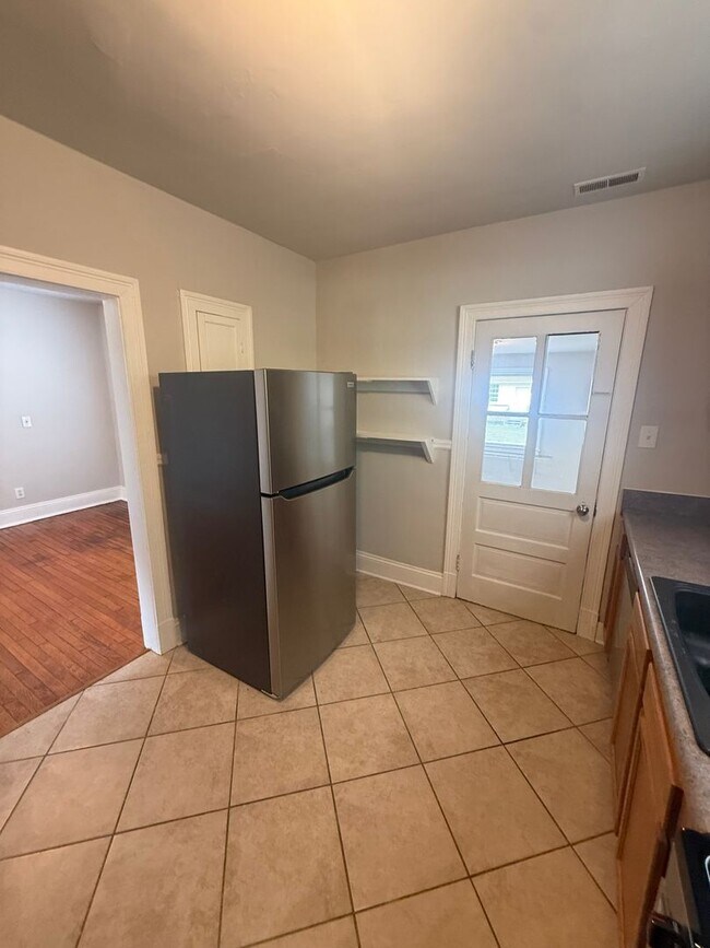 Building Photo - 2-bedroom 1 bathroom Cottage on a large lot with 2 large storage building on site