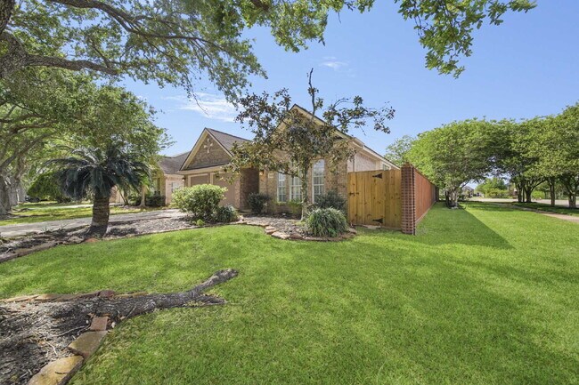 Building Photo - Peaceful Single-Story Home with Updated Flooring & Included Appliances