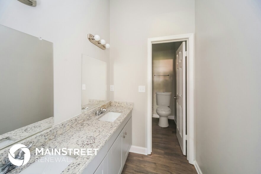 Building Photo - 6740 Stewart Forest Cove E
