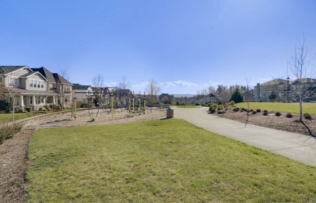 Building Photo - Modern Ground-Level Condo in River Terrace...