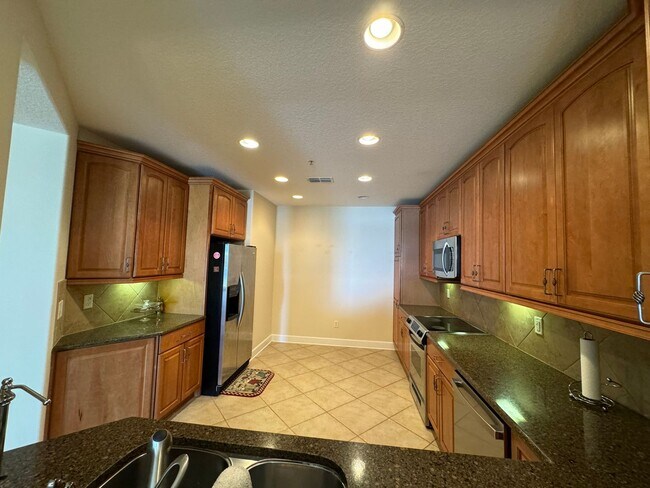 Building Photo - CONDO LOCATE IN GATED COMMUNITY  IN DR. PHILLIPS-TOSCANA - HALF OFF DECEMBER RENT