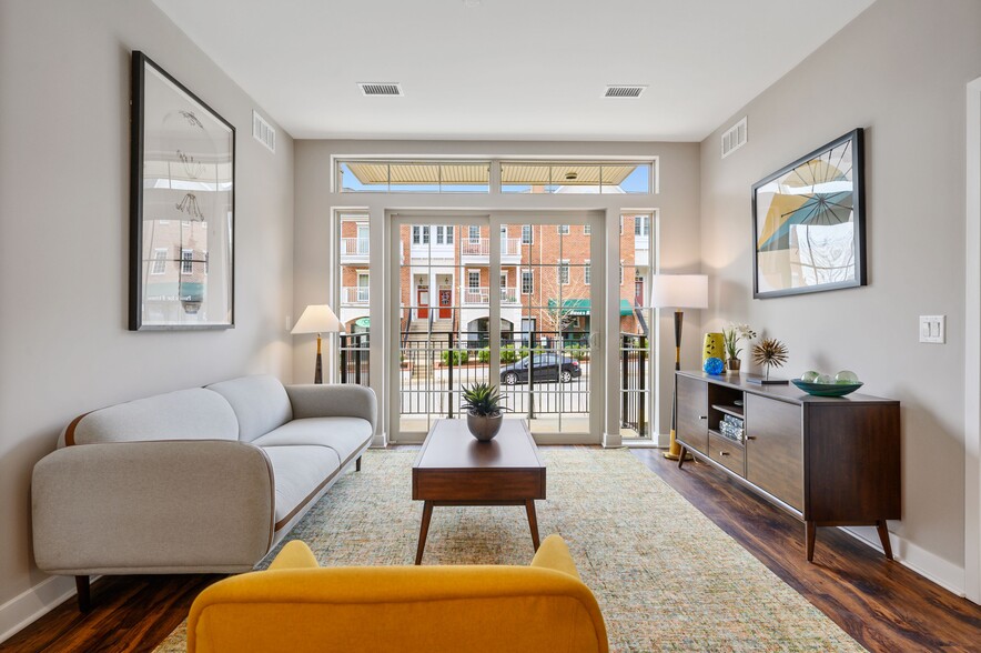 Living Room at Claremont on the Square Phase 2 - Claremont on the Square Apartments