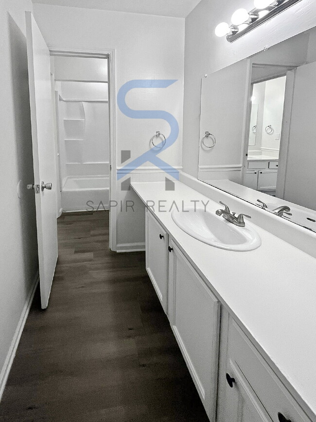 Building Photo - LIMITED-TIME OFFER! Apply today with NO APPLICATION FEE! Terms apply. Call (678) 487-7896, Option...