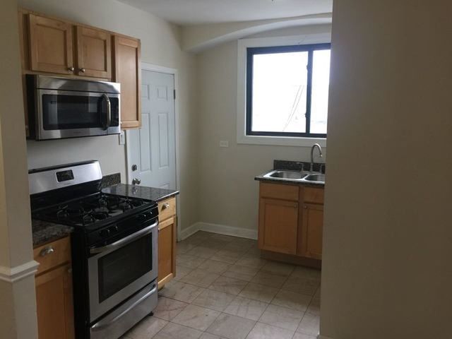 Building Photo - 5653 N Spaulding Ave