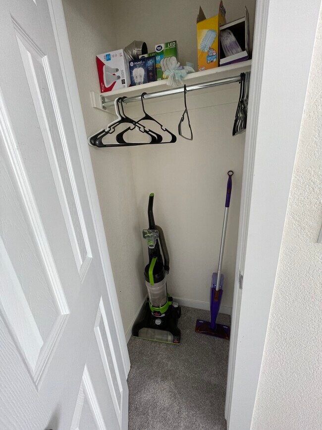 closet outside of primary bedroom - 9921 E 26th Ave