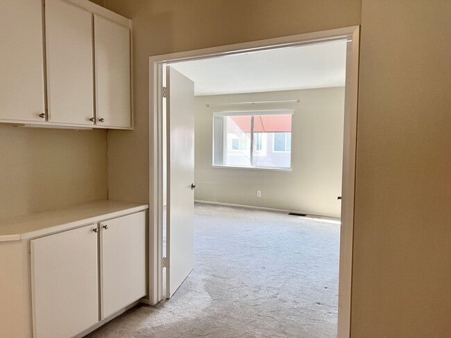 Building Photo - Working from home? This town home has a huge office area and large primary suite... plus a second...