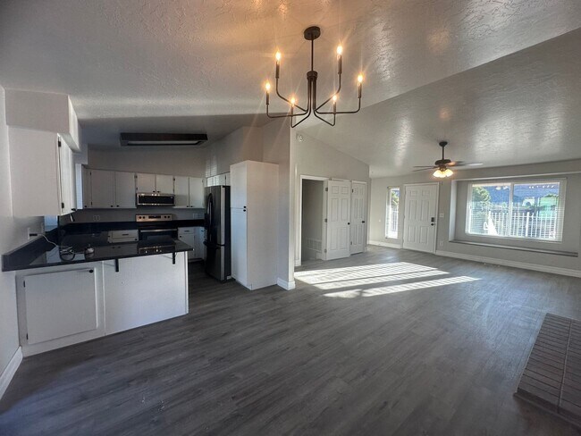 Building Photo - Quiet neighborhood, 3 bedroom, 2 bath home, huge front patio/deck, RV parking!