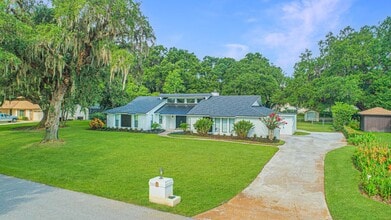 Building Photo - Beautifully Updated 3/2 Pool Home with Lar...