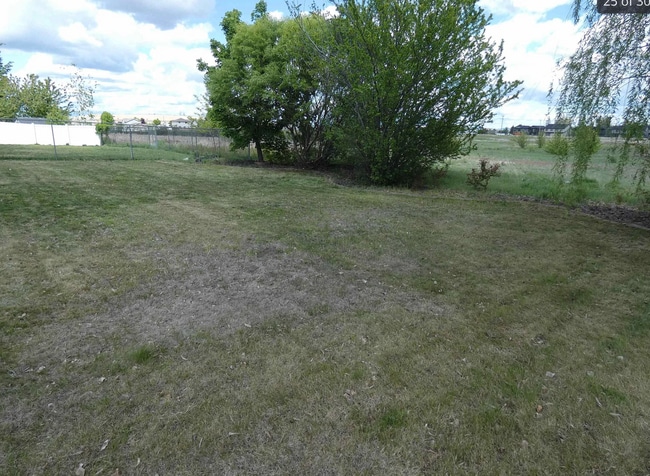 Building Photo - Spacious 4 BR/ 2.5BA