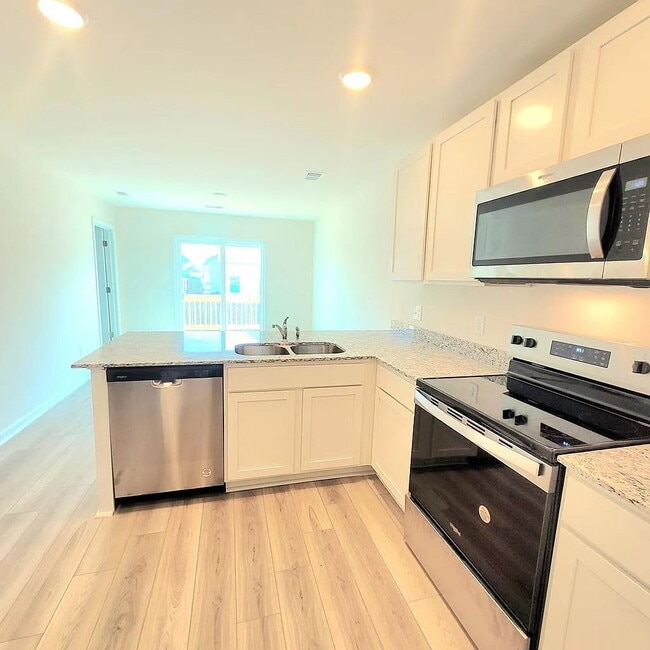 Building Photo - Available soon in new Canopy of Oaks at Hunters Crossing!