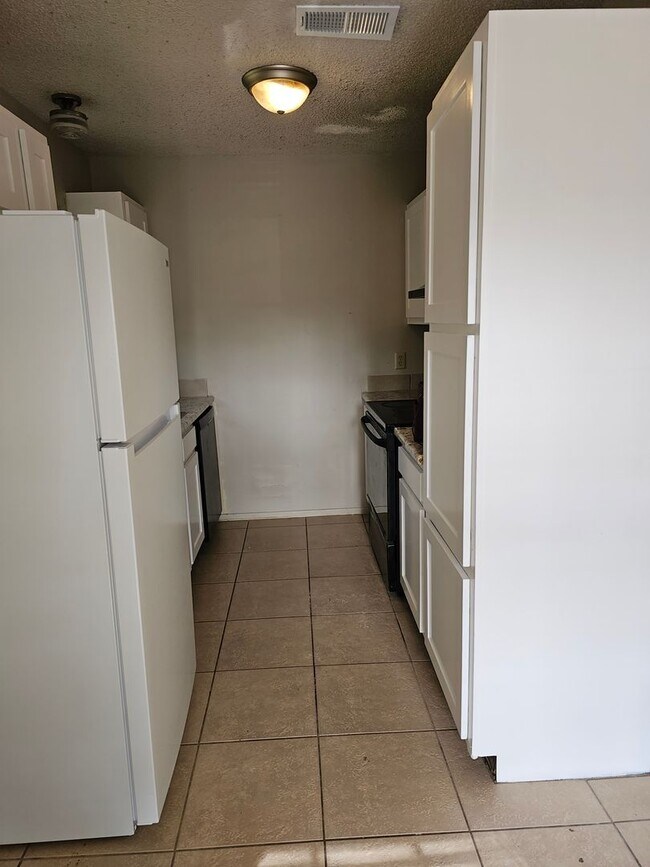 Building Photo - Available Now!