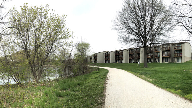 The building, pond, bicycle trail, and neighborhood - 2601 Westwinds Dr