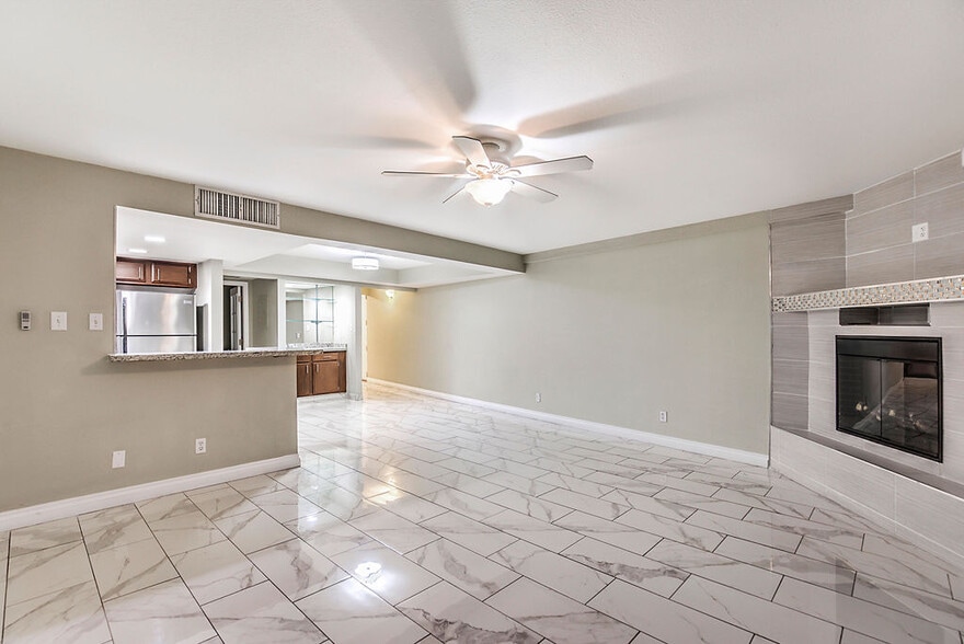 Living Room with Fireplace - Country Club Towers