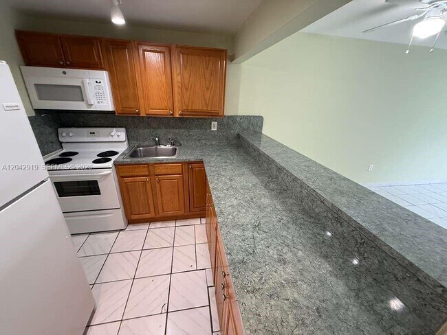 Building Photo - 17101 NW 57th Ave