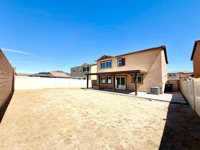 Building Photo - Modern 4 Bedroom 3 Bathroom Living with INCLUDED Solar & Entertainer’s Backyard