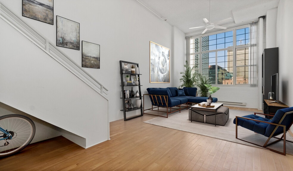 Your home has an open floorplan with large windows for natural light - Riverloft