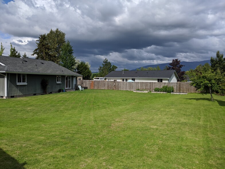 large grassy yard with views of the foothills - 1803 E Fox Hill St