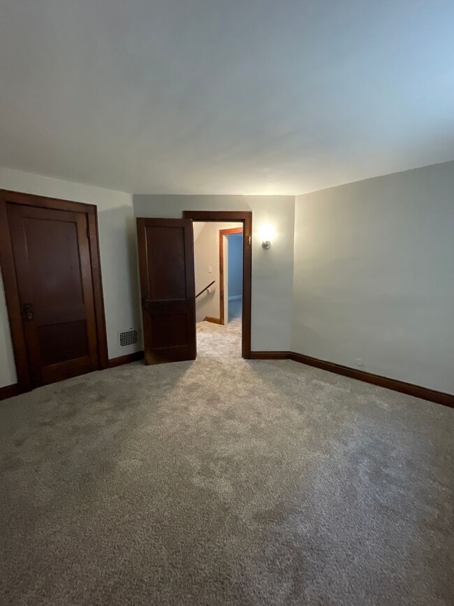 Building Photo - Introducing a charming Three Bedroom, One ...