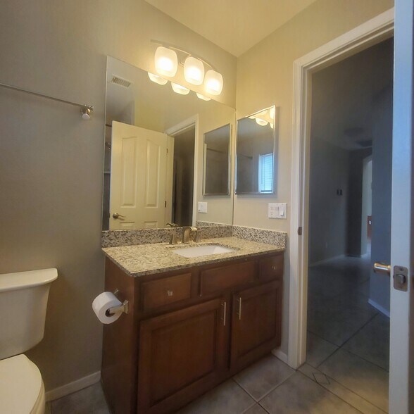 2nd bath vanity - 9139 W Davis Rd