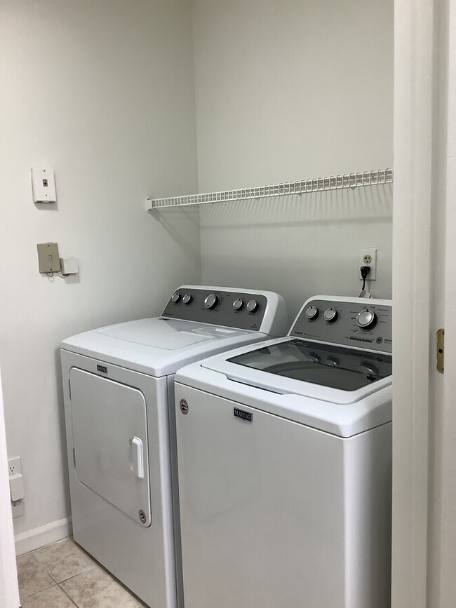 Washer and dryer is inside this condo. - 319 Granville Ct