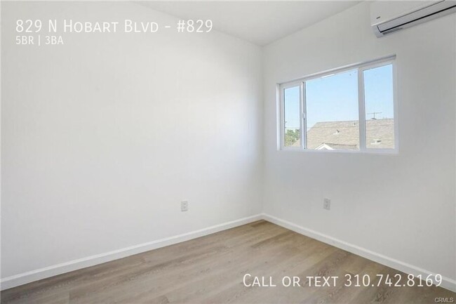 Building Photo - Luxe Living at 825 N. Hobart Blvd. – Where...