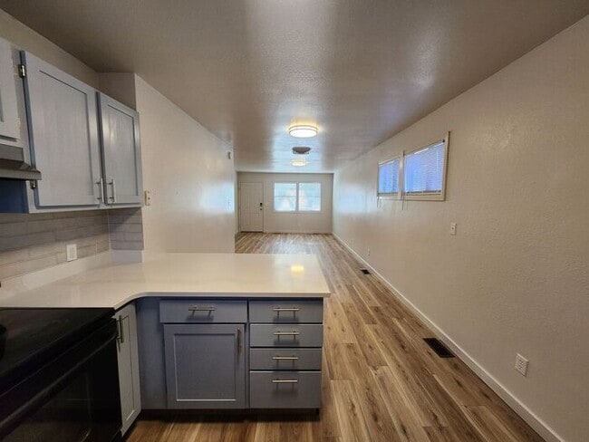 Building Photo - Renovated Cozy 2-Bedroom Duplex | Move In Now – Next Month’s Rent is Waived!