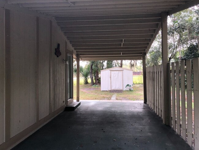 Building Photo - MOVE IN AUGUST!! COZY 2 BEDROOMS 1 BATHROOM HOME ON SPACIOUS FENCED IN LOT!! NEWER A/C!!