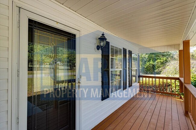 Building Photo - Updated house with carport and shed on corner lot!