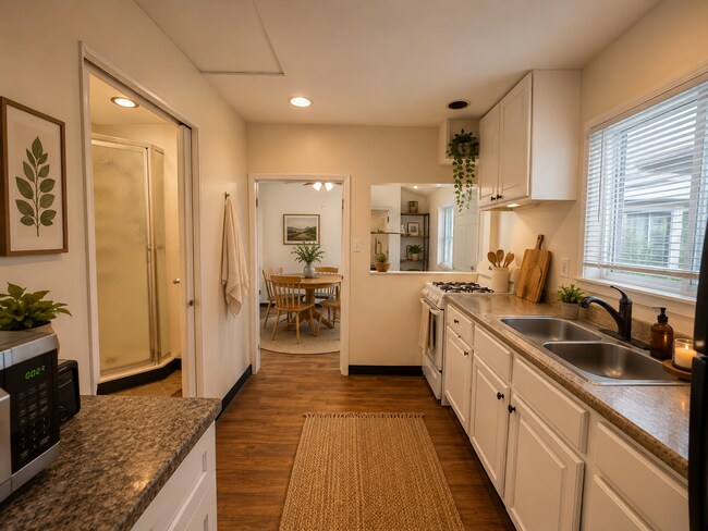 Building Photo - READY TO MOVE IN- MUST SEE - TWO CAR OFF STREET PARKING SPOTS AND UTILITIES PAID