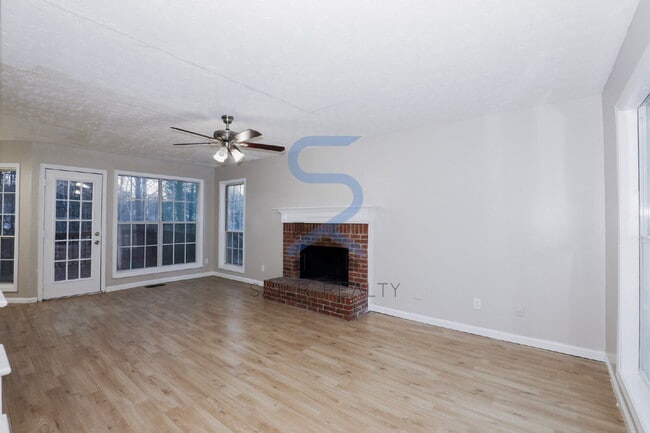 Building Photo - Move in before February 15th and choose your reward: a $250 Amazon Gift Card or a 55" Smart TV!