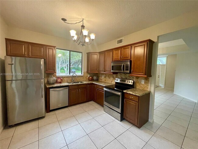 Building Photo - 7525 NW 61st Ter