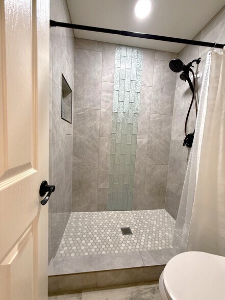 PRIMARY STEP IN SHOWER - 9040 E Winchcomb Dr