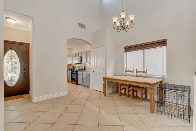 Building Photo - Pool Home with Downstairs Primary Bedroom!