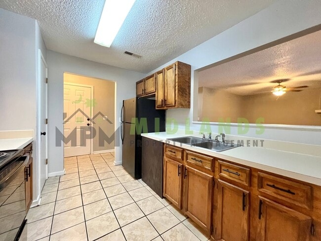 Building Photo - 6008 Village Creek Dr