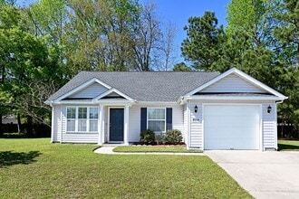 Building Photo - Charming 3BR Ranch in Osprey Woods – Screened Porch & Vaulted Ceilings