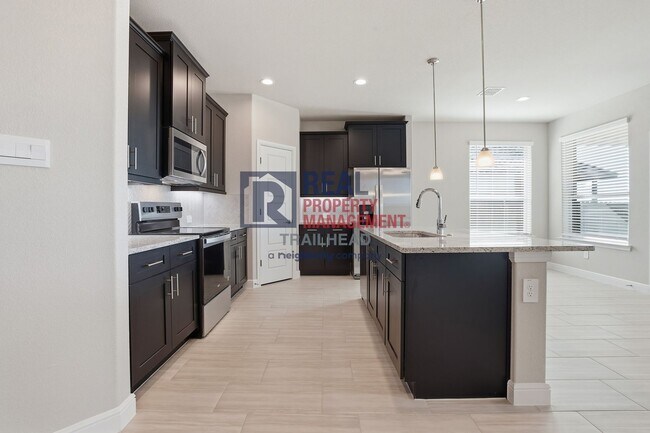 Building Photo - Inviting 4-Bedroom Home with Open Layout in Bella Vista