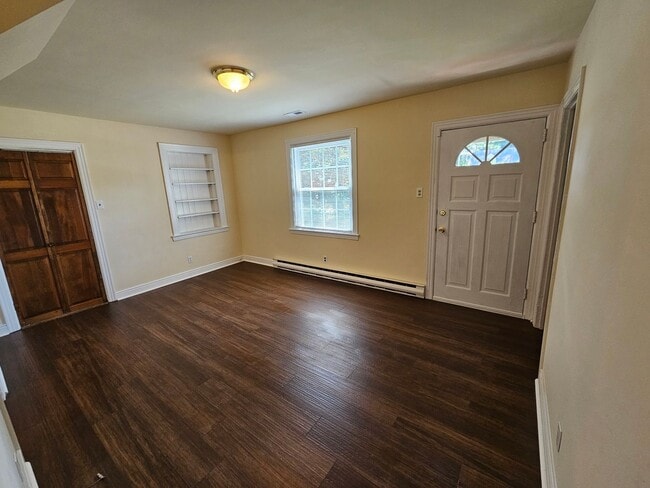 Building Photo - First Offering - 4BR/2BA Brick Cape Cod - ...