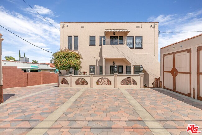 Building Photo - 1557 S Genesee Ave