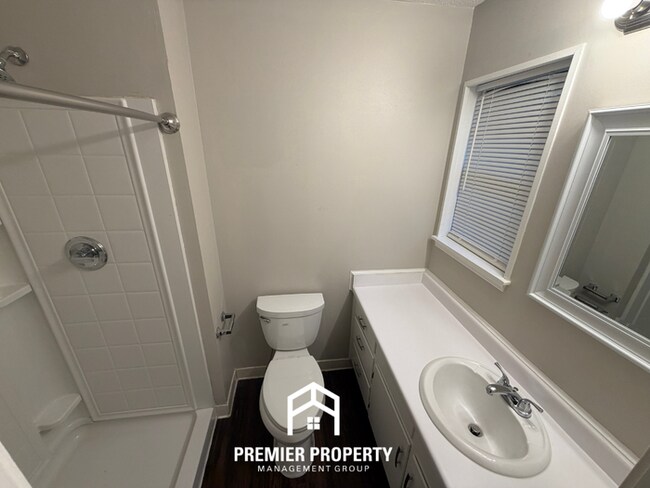 Building Photo - Charming 3BR/2BA Northport Home with Hardwood Floors & Brick Fireplace!