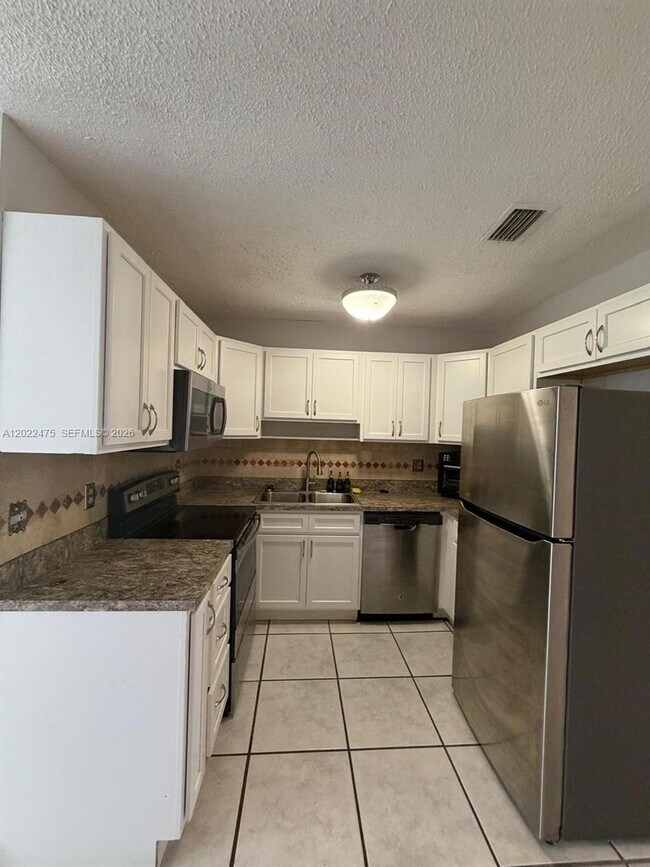 Building Photo - 9116 NW 35th Pl