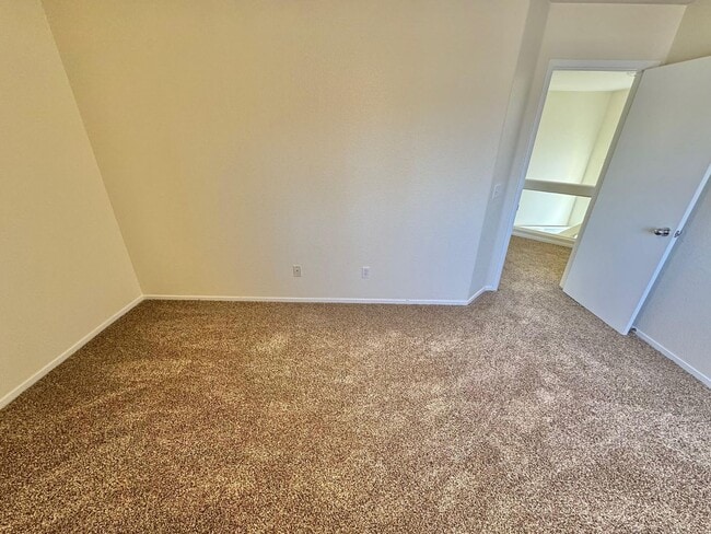 Building Photo - WELCOME TO THIS SPACIOUS 4-BEDROOM, 2.5-BA...