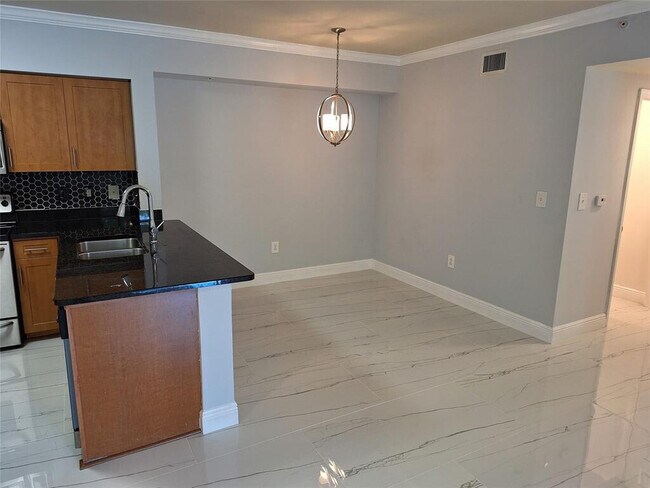 Building Photo - 6492 Emerald Dunes Dr
