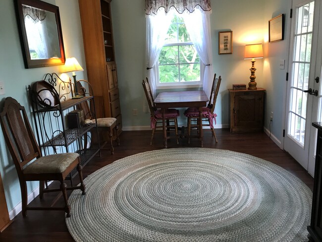 DINING ROOM/FRENCH DOORS OPEN TO PORCH - 203 Three Runs Plantation Dr