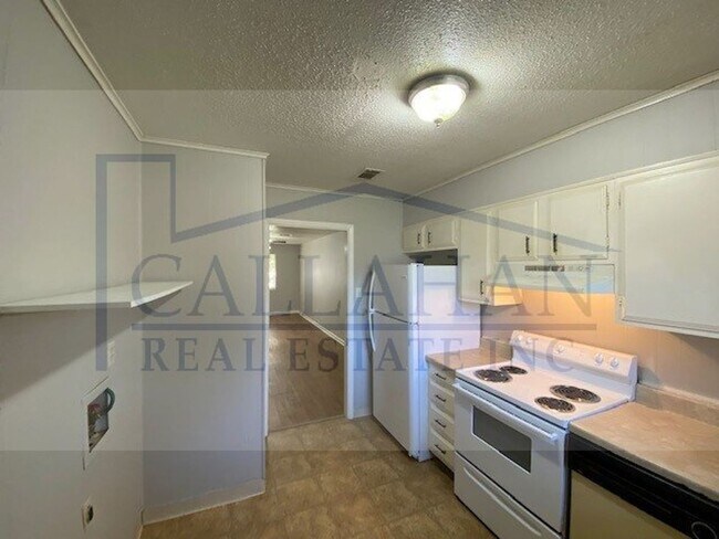 Building Photo - 8211 Woodview Dr N